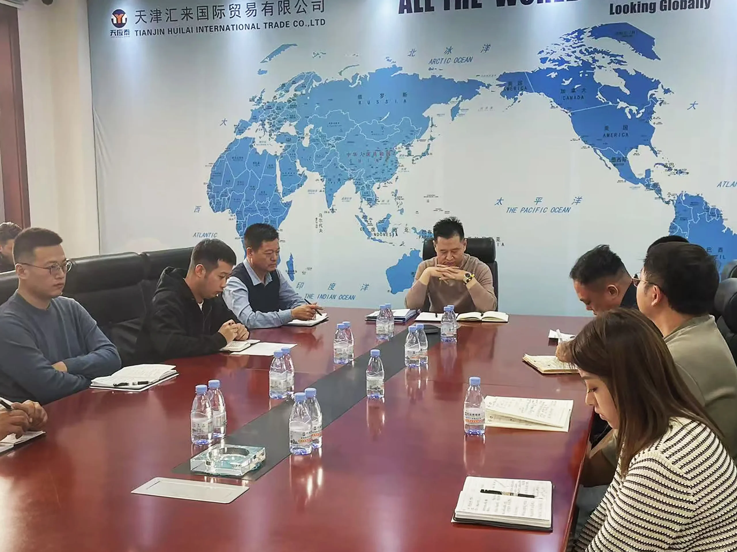 Company-wide staff participating in 2024 business review and planning